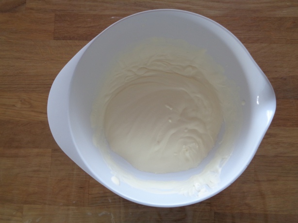 Stir the cream until it is creamy