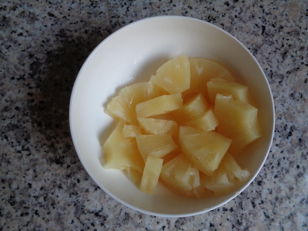 Cut the pineapple to small pieces