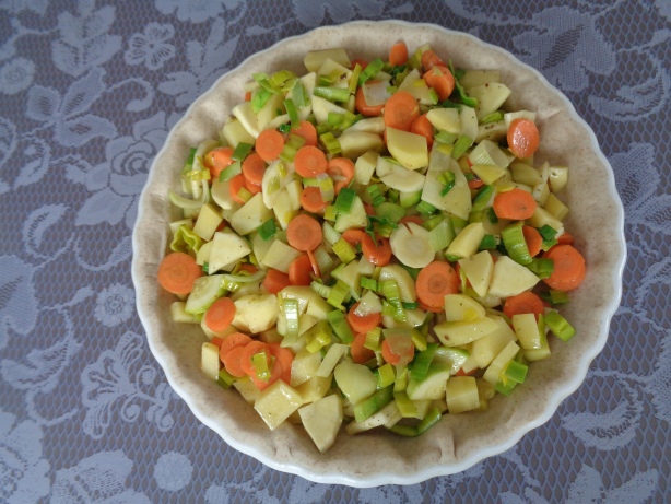 Spread the cooked vegetables on the cake pan