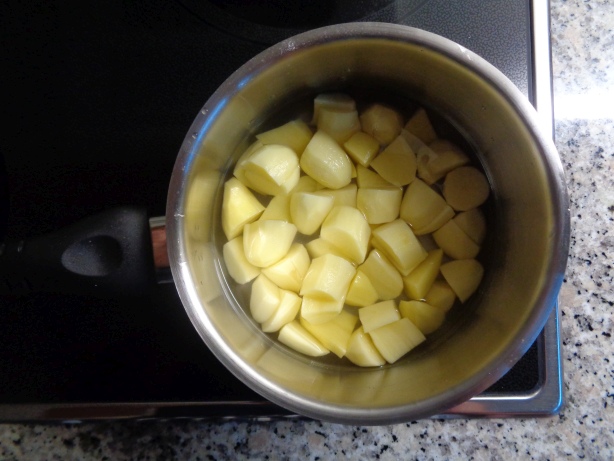 Peal, slice and Cook the potatoes