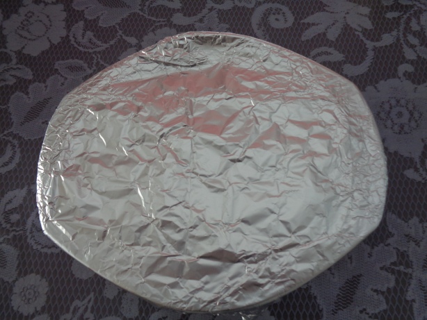 Cover the baking dish with an aluminium foil