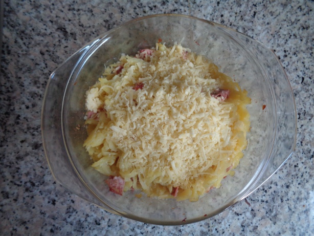 Scatter the grated cheese over