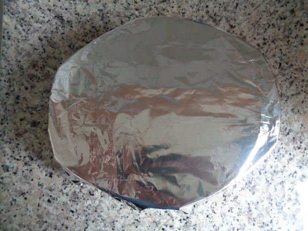 Cover the cake pan with an aluminium
