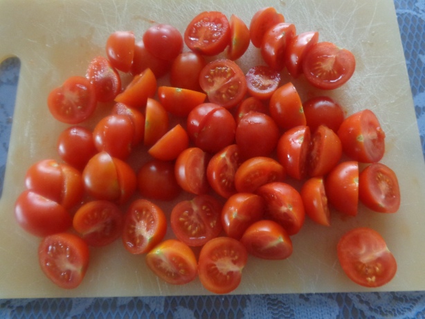 Cut in half the cherry tomatoes