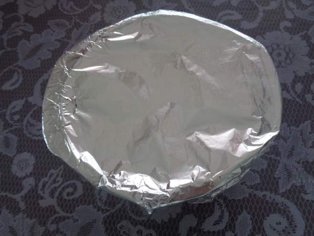 Cover the baking dish with an aluminium foil
