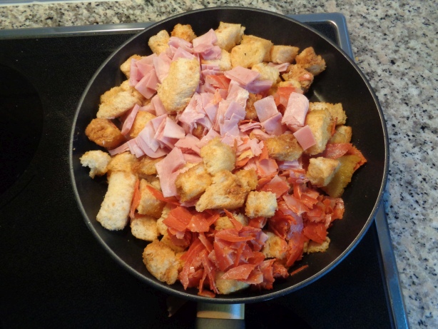 Add the the ham and the Chorizo